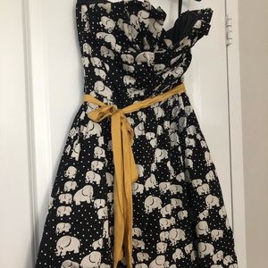 Tea length black and white strapless dress